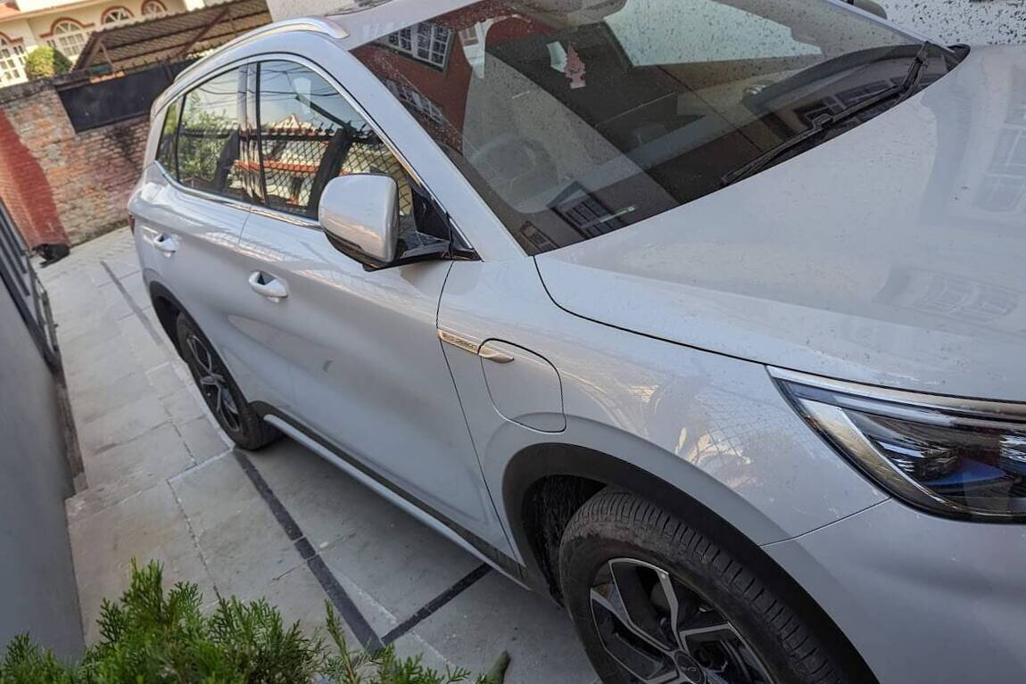 White BYD Atto 3 parked in a driveway in Kathmandu, Nepal